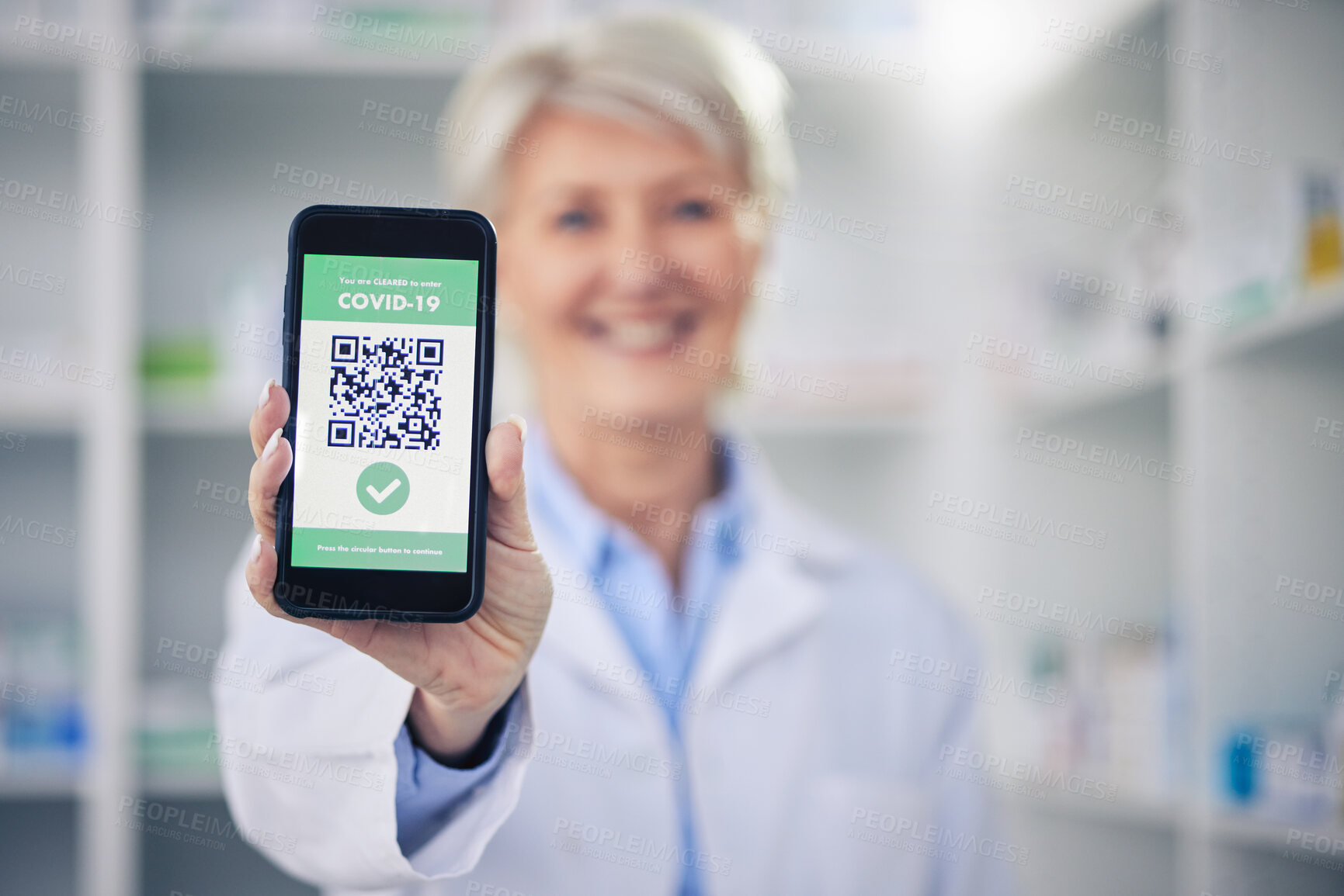 Buy stock photo Woman, pharmacist and phone with QR code scan for covid certification or verification at pharmacy. Hands of female person, medical or healthcare professional show mobile smartphone app for approval