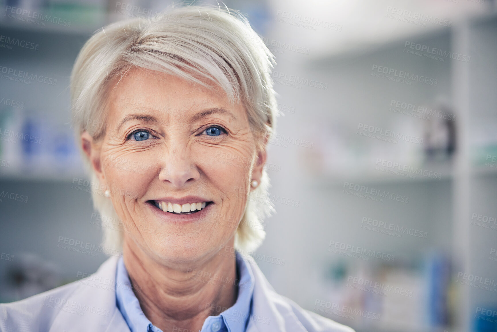 Buy stock photo Face, senior pharmacist and happy woman in pharmacy, drugstore or shop for wellness medicine. Smile, medical professional and portrait of doctor, elderly healthcare expert and person from Canada.