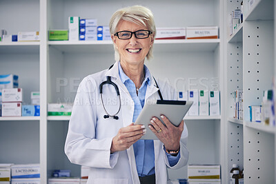 Buy stock photo Senior woman, pharmacist and clinic tablet portrait with medical stock and digital research. Pharmacy, healthcare store and pills with elderly female employee with a smile with medicine information 