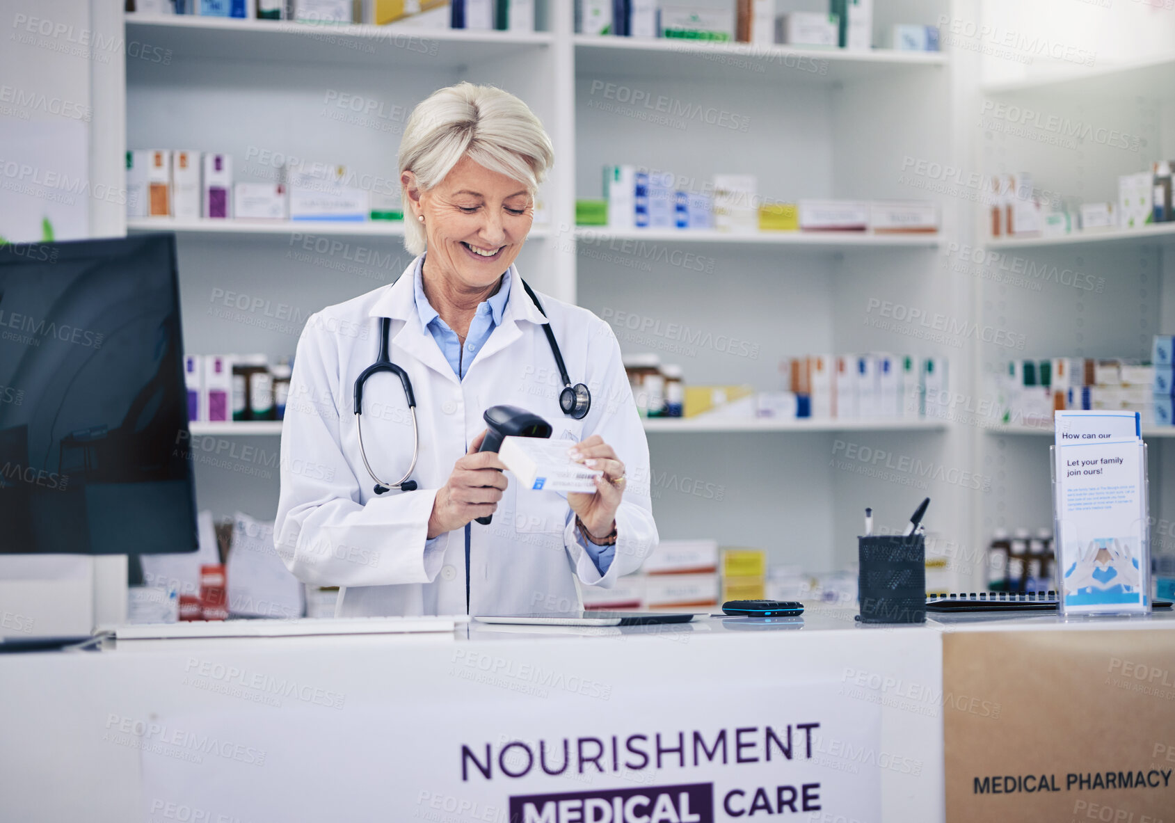 Buy stock photo Mature pharmacist, woman and scanning pills, cashier with medicine and pharmacy, digital and stock barcode. Pharmaceutical store, tablet box and female person with health, service and retail commerce