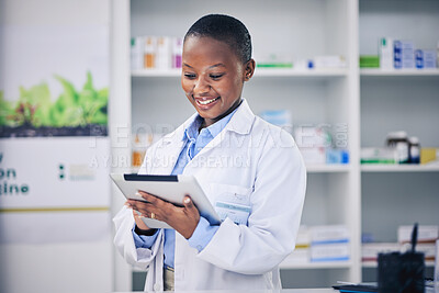 Buy stock photo Black woman, happy pharmacist and tablet for healthcare, telehealth and research in pharmacy, drugstore or shop. Medical professional, technology and African doctor with wellness email for medicine.