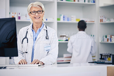 Buy stock photo Pharmacist, portrait and happy senior woman on computer in pharmacy, drugstore or shop. Smile, medical professional and face of doctor on internet for telehealth, healthcare and research for medicine