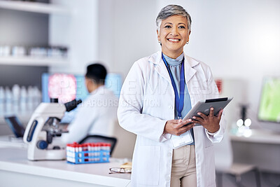 Buy stock photo Senior scientist, woman with tablet and portrait, digital science data for medical research in lab. Biotech, female doctor with scientific experiment results and future, investigation and knowledge