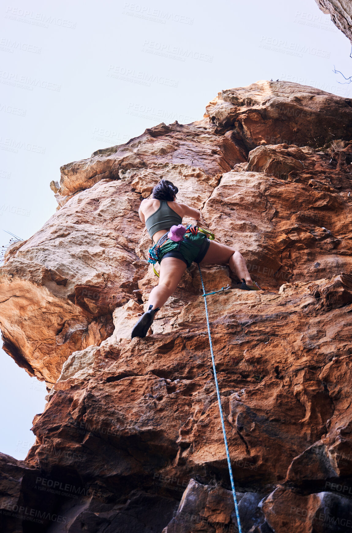 Buy stock photo Rock climbing, travel and mountains with woman in nature for sports, explore and adventure. Health, exercise and fitness with person training on cliff for rope, challenge and performance