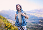 Portrait, mountain climbing and rope with a man hiking in the wilderness for adventure or to explore nature. Smile, fitness and sports with a happy young male athlete outdoor for a training challenge