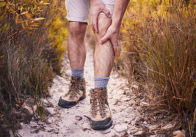 Buy stock photo Hiking, leg pain and shoes of man in nature for injury, training and accident. Emergency, healthcare and inflammation with closeup of person walking on path for muscle, trekking and exercise problem