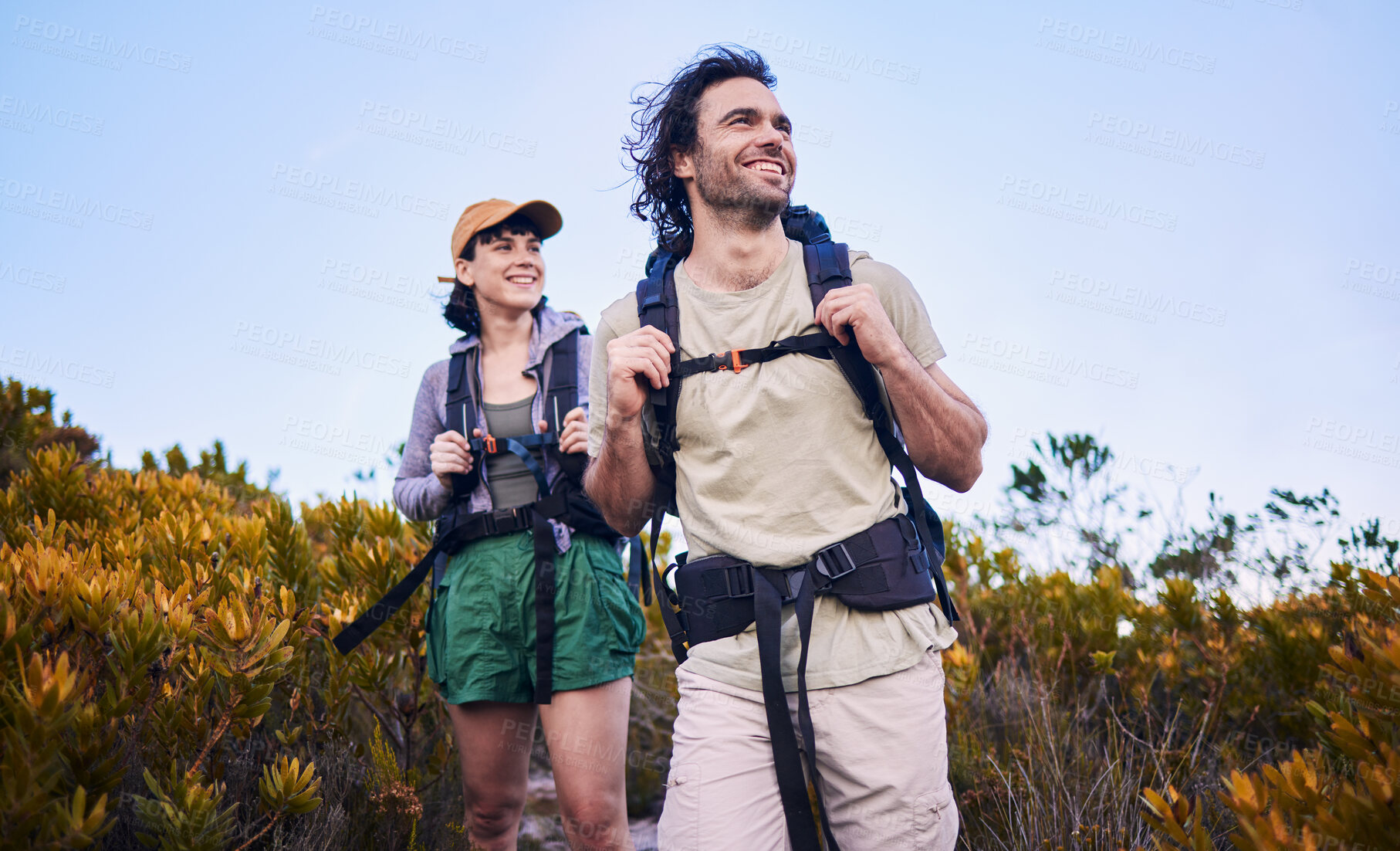 Buy stock photo Hiking, travel and couple walking in nature for adventure, holiday and sightseeing journey on mountain. Fitness, dating and happy man and woman excited to explore, trekking and backpacking outdoors