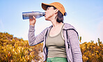 Thinking, hiking and woman drinking water in nature for wellness, health and after training. Hydration, idea and an athlete with a bottle to drink after running, workout or cardio on the mountain