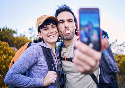 Buy stock photo Hiking, silly selfie and couple on mountain for adventure, holiday and journey on mountain. Travel, dating and happy man and woman take goofy picture for memories, trekking and backpacking outdoors