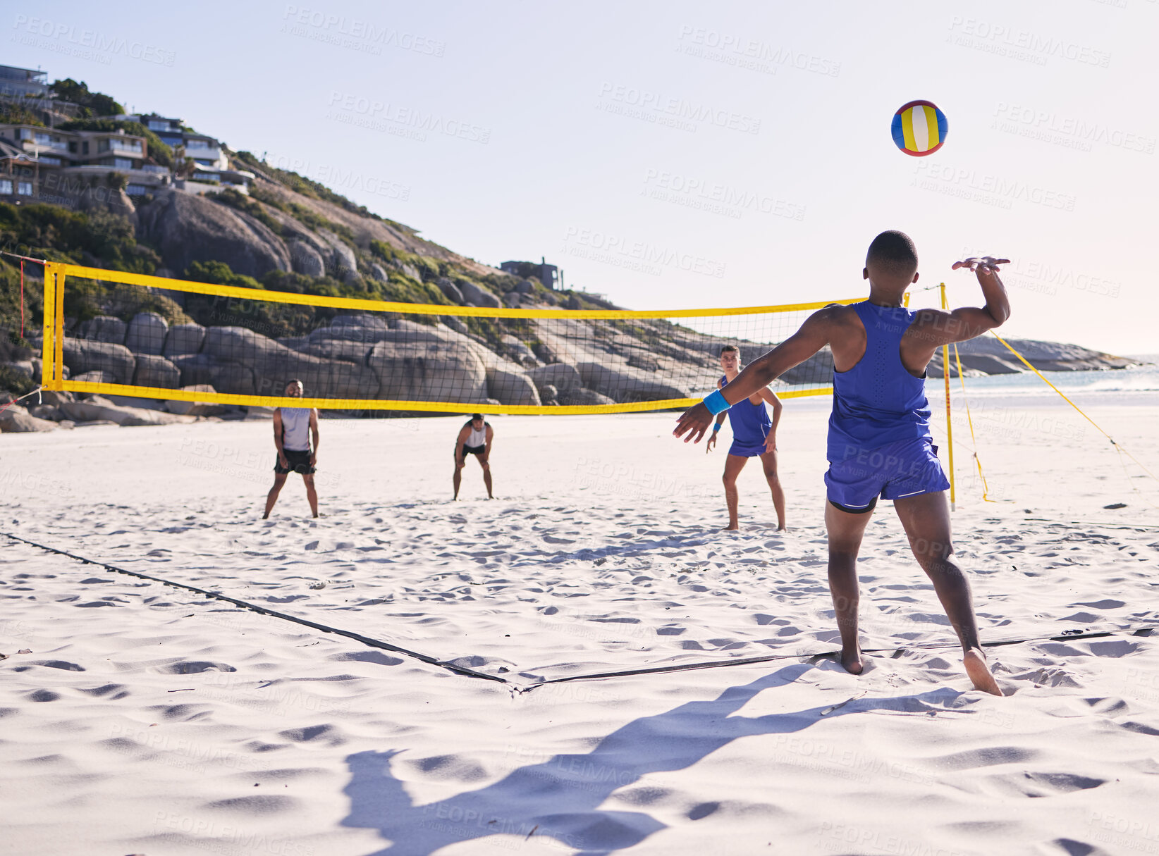 Buy stock photo Beach, volleyball and man serve on team with competition at ocean with exercise, sport and fitness. Summer, outdoor and training people play for health, holiday games and workout activity in nature