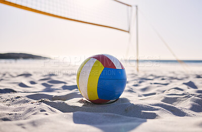 Buy stock photo Beach, volleyball and sand with background of ocean and sea with exercise, sport and fitness equipment. Summer, outdoor and training ball on the ground for health, game and workout activity in nature