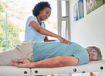 Massage relax, black woman and with a man for physiotherapy, spa treatment or muscle rehabilitation. Calm, African physiotherapist and a mature patient for physical therapy or chiropractic care