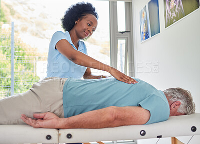 Buy stock photo Massage relax, black woman and with a man for physiotherapy, spa treatment or muscle rehabilitation. Calm, African physiotherapist and a mature patient for physical therapy or chiropractic care