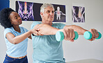 Dumbbells, senior man and physiotherapy with black woman for help at clinic for workout or with training. Patient, physical therapy and help with nurse or equipment in nursing home or rehabilitation.