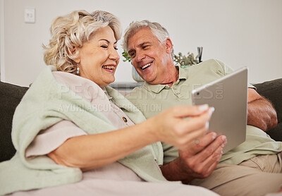 Buy stock photo Senior couple, relax and tablet on sofa in home living room for love, movies and streaming internet show. Happy woman, elderly man and digital technology for social media, reading news app or website