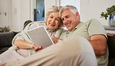 Buy stock photo Senior man, woman or tablet on sofa to download news app, reading social media post or ebook. Happy elderly couple scroll website on digital technology, internet blog or online shopping in retirement
