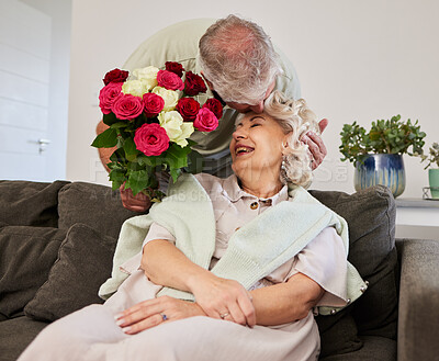 Buy stock photo Couple kiss, senior and flowers for a birthday, love or celebration of marriage together. Happy, care and elderly man with bouquet for a woman in a home for a surprise, date or gift for anniversary
