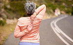 Senior woman runner, stretching back and training in street, nature and exercise for wellness in retirement. Mature lady, running and workout on countryside road, mountains and warm up muscle outdoor