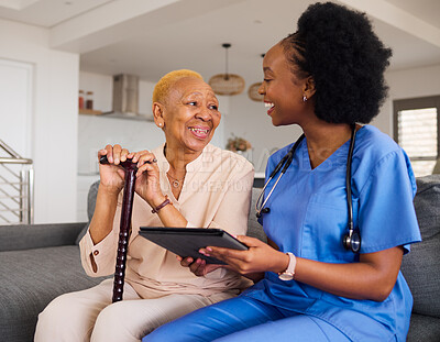 Buy stock photo Health consultation, nurse and black woman with tablet for medical information or advice online. Smile, conversation and an African nurse helping a senior patient with healthcare on an app in a house