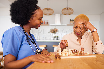 Buy stock photo Black people, nurse and thinking in elderly care for chess, fun or social activity together at home. African medical professional playing strategy board game with senior female person in the house