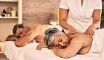 Relax, senior and a couple at the spa for a massage together for peace, wellness or bonding. Luxury, beauty or body care with an old woman and man in a beauty salon for physical therapy or treatment