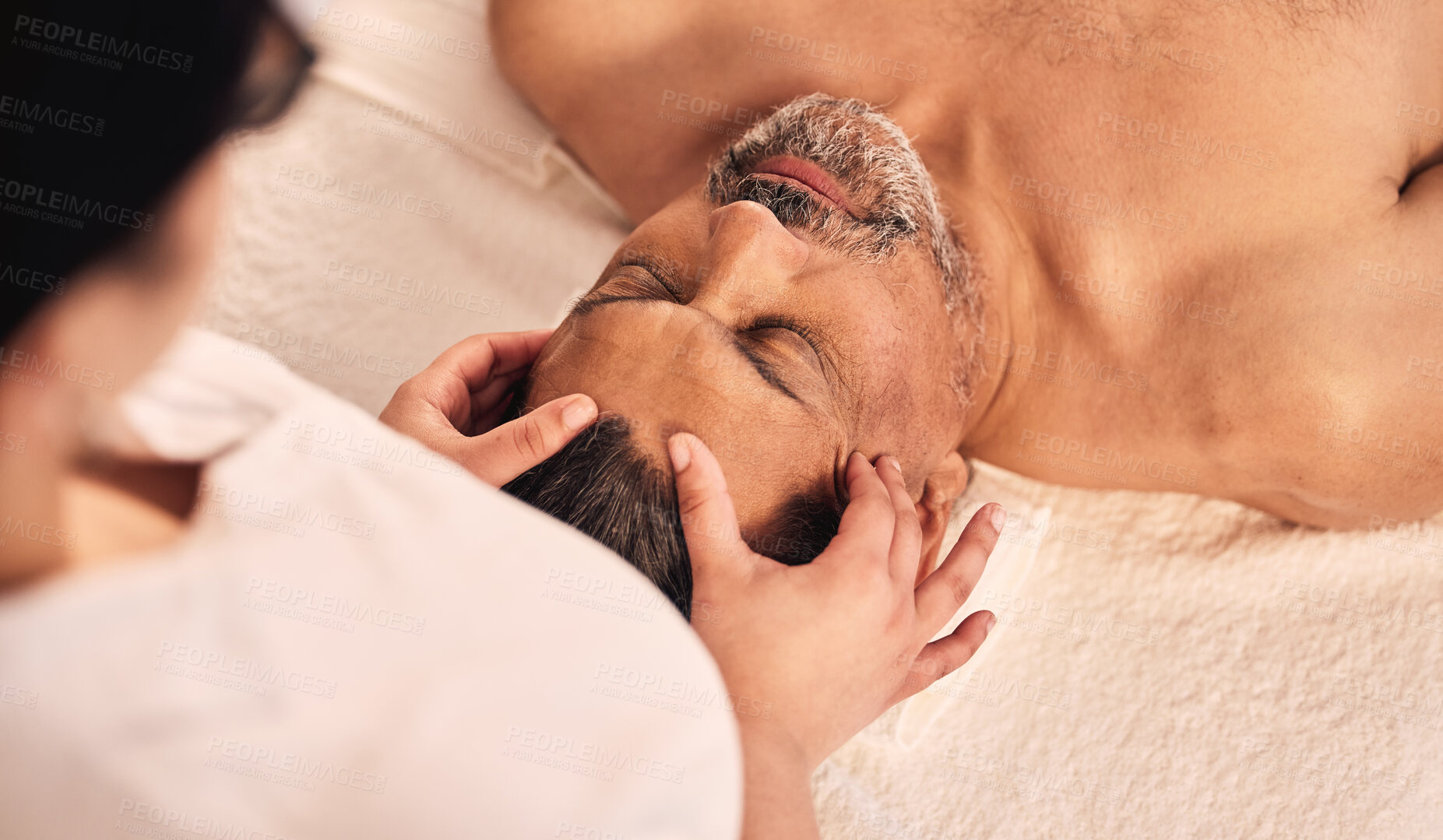 Buy stock photo Man, spa and head massage for skincare treatment, holistic therapy and zen healing at beauty salon from above. Mature male person relax at wellness retreat for self care, peace and facial acupressure