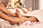 Foot, massage or closeup of spa therapist in acupressure service, luxury wellness and relax for circulation therapy. Feet, client or hands of beautician at salon for pedicure, skincare or reflexology