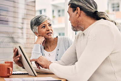 Buy stock photo Senior couple, planning or stress on tablet with financial documents, taxes or retirement questions in cafe. Debt crisis, senior woman or mature man speaking of insurance, bills or asset management