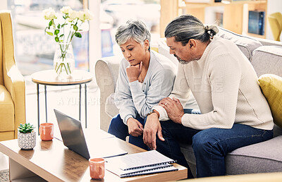 Buy stock photo Computer, thinking and senior couple planning, finance documents and retirement funding or loan at home. Sofa, life insurance and asset management of elderly woman, man and debt stress on laptop