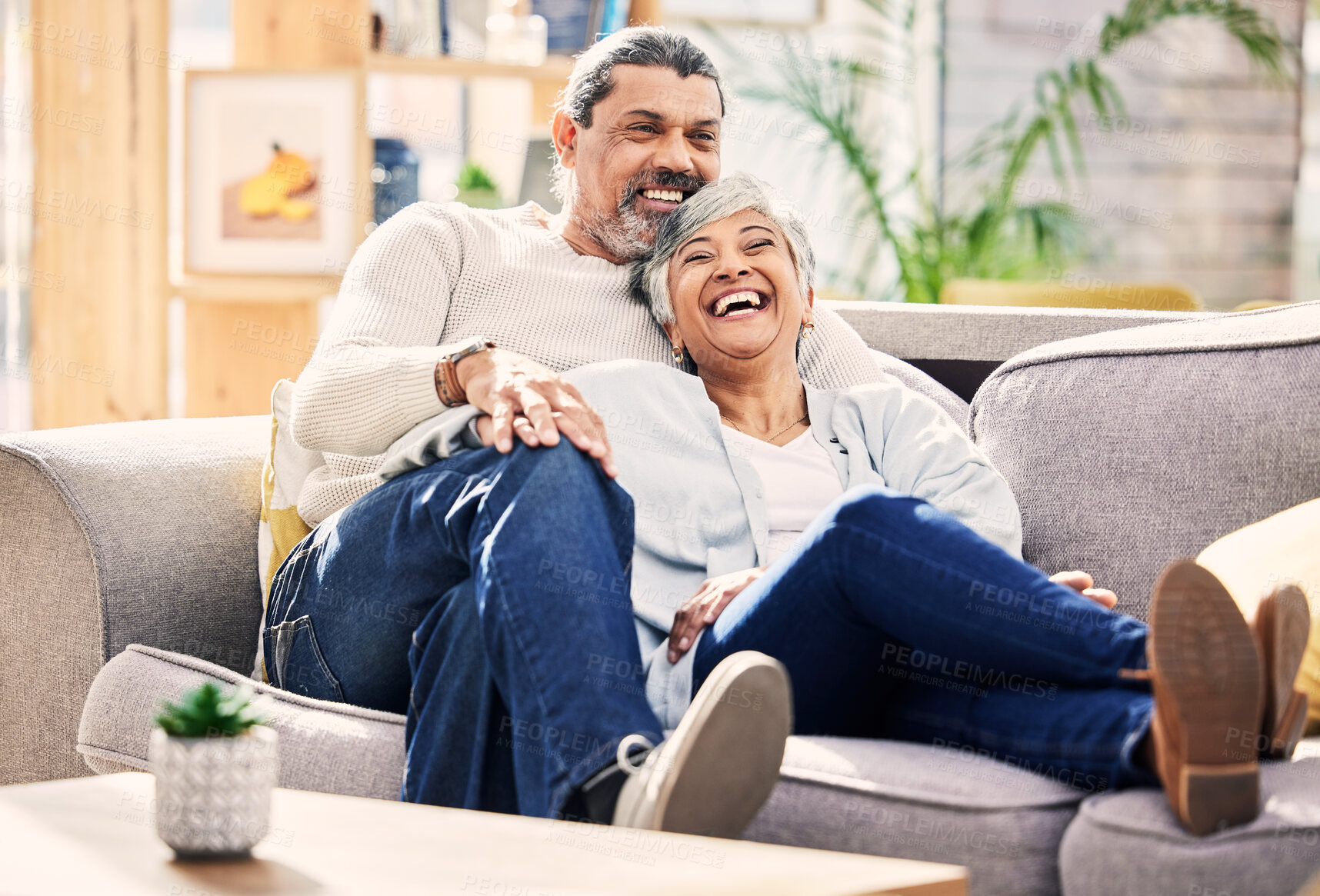 Buy stock photo Laughing, happy or old couple on couch to relax, enjoy romance or joke together at home in retirement. Living room, senior woman or funny elderly man bonding with love, support or smile on sofa