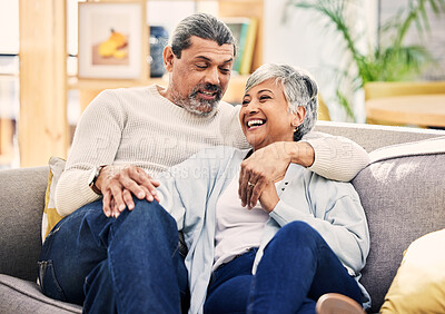 Buy stock photo Home, talking and senior couple on a couch, love or relax with happiness, marriage or romance. Romantic, elderly woman or mature man on a sofa, relationship or smile with conversation or quality time