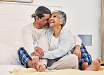 Hug, funny or old couple in bed to relax, enjoy romance or  morning time together at home in retirement. Embrace, senior woman or happy elderly man laughing or bonding with love, support or smile 
