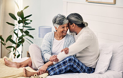 Buy stock photo Senior couple in bed together, hug with love and comfort, morning routine and happiness with bonding at home. Retirement, relax and communication, marriage and life partner with people in bedroom