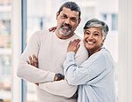 Portrait, smile and senior couple with arms crossed in house to relax in retirement home together. Face, happy and elderly man and woman with confidence, love and care, trust and support for loyalty