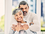 Portrait, happy and senior couple hug in house to relax in retirement together. Face, embrace and elderly man and woman smile for love, care and trust for support, commitment or loyalty in marriage.