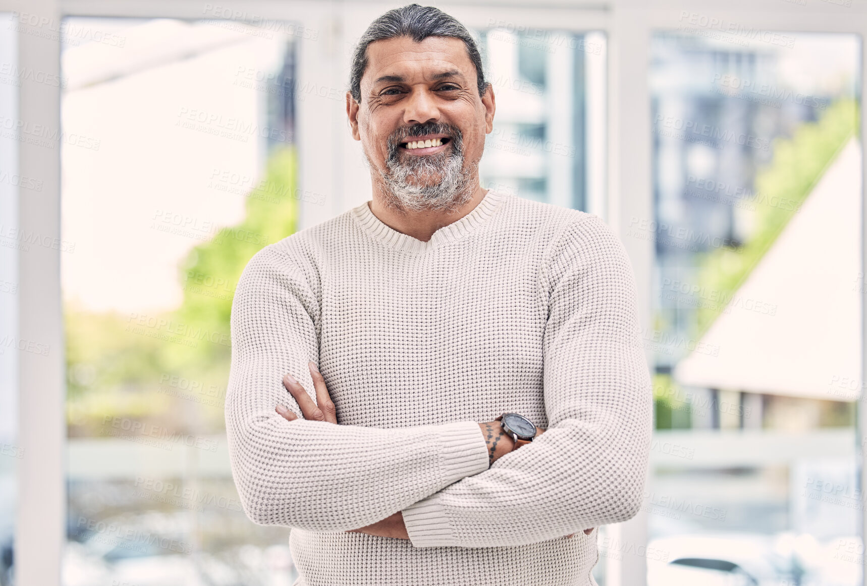 Buy stock photo Portrait, smile and senior man with arms crossed in house for positive mindset, relax in retirement home and joy. Face, happy and elderly male person from India with confidence in casual clothes.