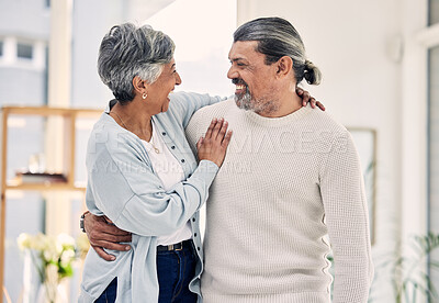 Buy stock photo Hug, marriage and senior couple with love, quality time and care with happiness, home and relationship. Old woman, happy mature man or embrace in a lounge, loving together and romance with commitment