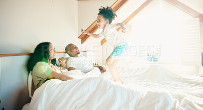 Buy stock photo Kid, jump and bed with parent with happiness for bonding with games on weekend for fun in home. Playful, energy and girl with family in morning for quality time with excited child and wake up.