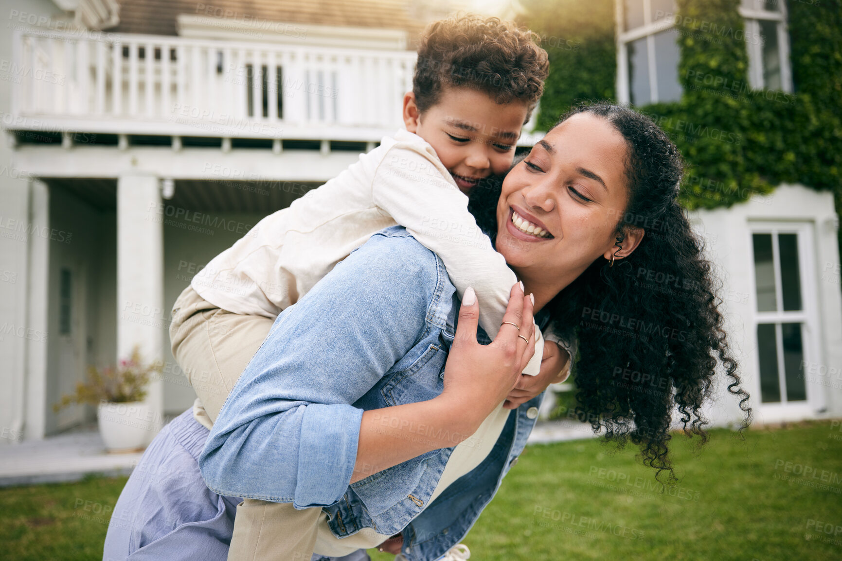 Buy stock photo Mother, son and piggyback, hug outdoor with love and bonding, relax on lawn at holiday home with fun and happiness. Playful, smile and trust, woman and boy together in garden with vacation and nature