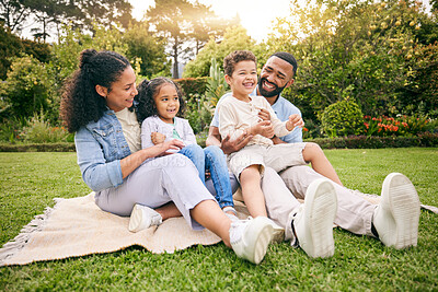 Buy stock photo Picnic, nature or happy family relax, laugh or enjoy outdoor quality time together, funny joke and comedy. Summer freedom, green grass field or bonding mother, father and kids laughing in garden park