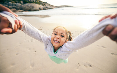 Buy stock photo Happy, spin and portrait of child at the beach for travel, support and fun. Swinging, smile and summer with girl and holding hands with family together for vacation, trust and seaside holiday
