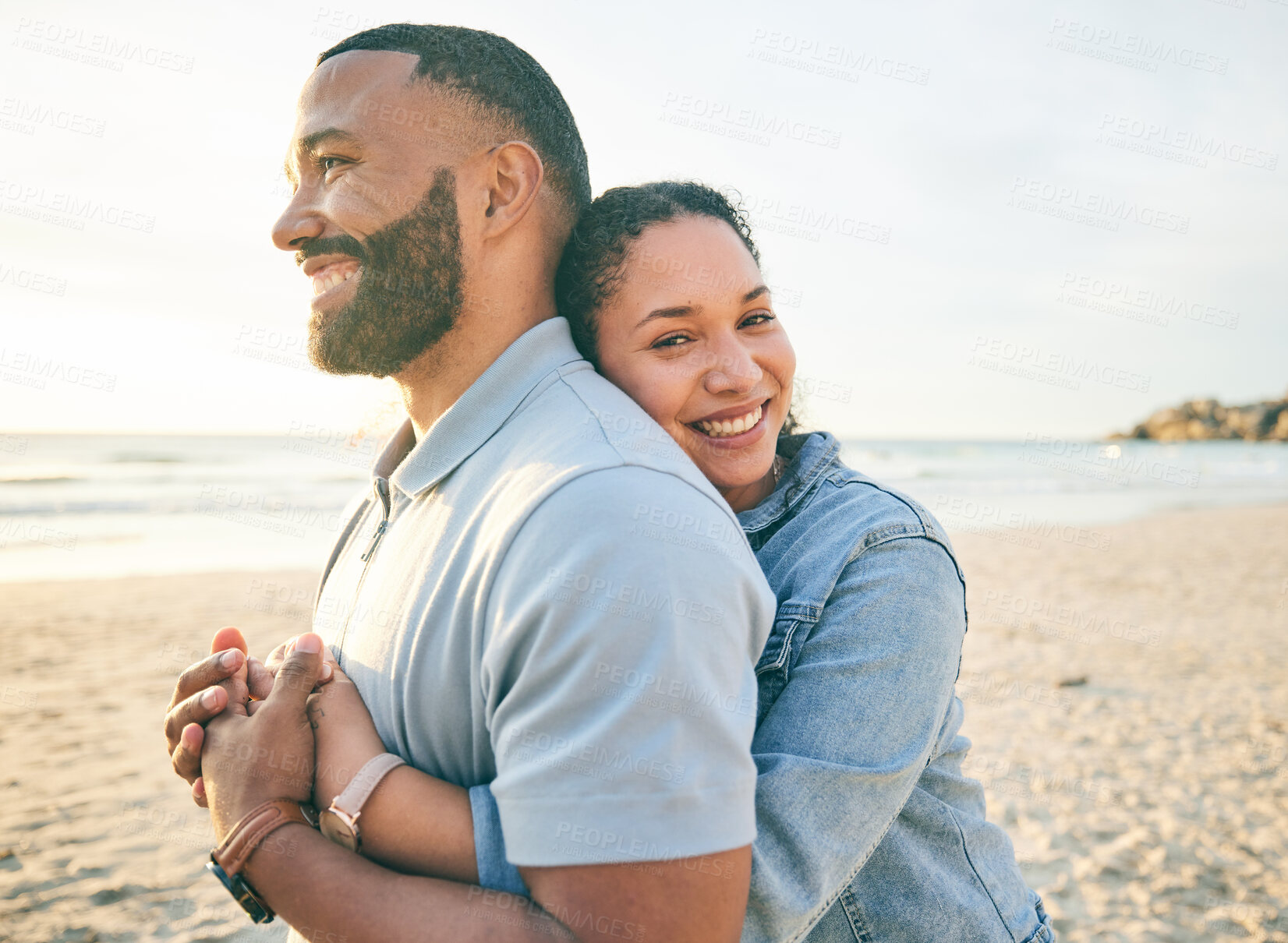 Buy stock photo Hug, beach and couple with love, holiday and marriage with happiness, summer trip and bonding. Romance, happy man or woman embrace, seaside vacation and relationship with adventure, sunset and loving