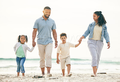 Buy stock photo Happy family, holding hands and walking at a beach for travel, vacation and fun in nature together. Freedom, parents and children relax at the sea on holiday, trip or adventure on ocean sand in Bali