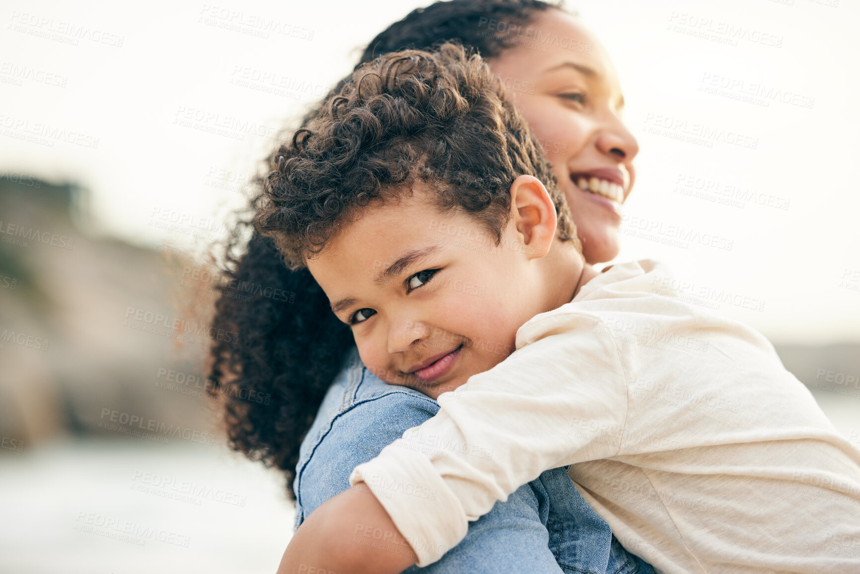 Buy stock photo Hug, portrait and a mother and child at the beach for summer, holiday or happiness together. Smile, care and mom with a kid at the ocean for a vacation, bonding or travel in Costa Rica for love