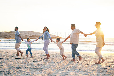 Buy stock photo Love, family walking and holding hands on beach in summer for vacation with sunshine or sea. Holiday, generations and kid or parents together at ocean for travel with trust for bonding with freedom.