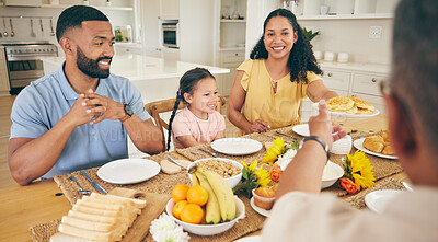 Buy stock photo Parents, grandparents and children at table for breakfast, dinner and meal together for bonding at home. Family, happy and mother, father and kids with food for eating, social gathering and wellness