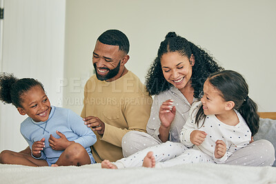 Buy stock photo Family, playful and bed with children in morning for quality time on weekend in home with care. Happiness, parents and  kids together for fun in bedroom with laugh or bonding for love with smile.