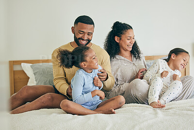 Buy stock photo Morning, family and playful with children on bed for happiness on weekend for quality time in home. Fun, father and mother with kid together in bedroom with love or laugh and care with bonding.