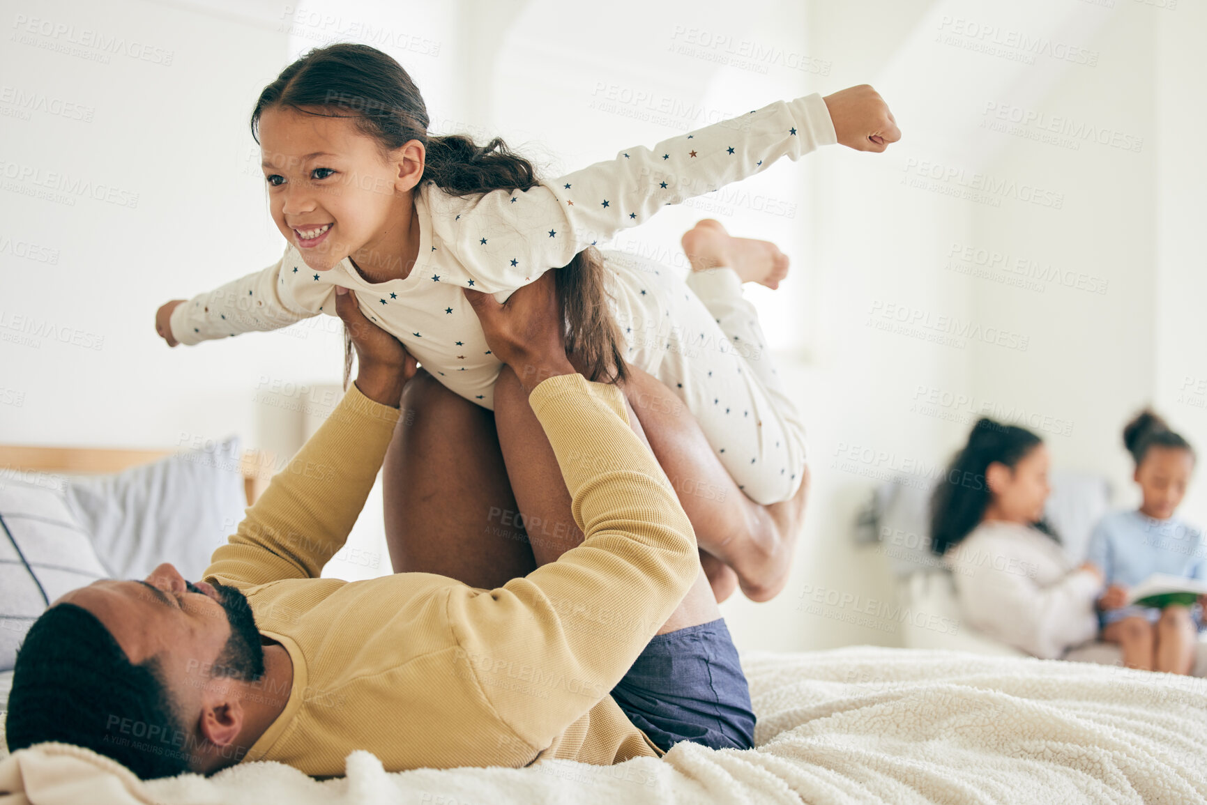 Buy stock photo Happy family, airplane and father with girl child on a bed for playing, bond and relax in their home together. Flying, play and kid with parent in a bedroom with vacation freedom, wake up and smile