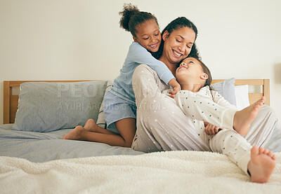 Buy stock photo Mother, bed and children hug or happy with parent together in the morning laughing in a bedroom in a home. Funny, bonding and mom enjoy quality time with kids or girls with happiness and love